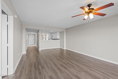 The views and sunsets in this 2 bedroom / 2 bathroom condo are on Oceans Golf Club in Florida - for sale on GolfHomes.com, golf home, golf lot