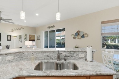 Located within the prestigious Lake Ashton 55+ community on Lake Ashton Golf Club in Florida - for sale on GolfHomes.com, golf home, golf lot