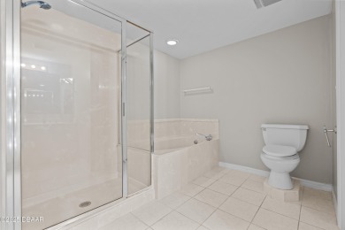 The views and sunsets in this 2 bedroom / 2 bathroom condo are on Oceans Golf Club in Florida - for sale on GolfHomes.com, golf home, golf lot
