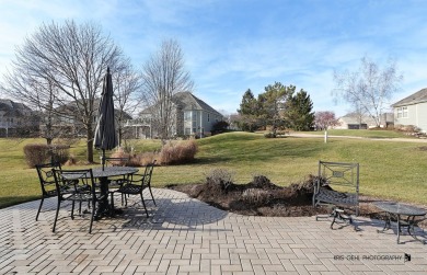 Located on a corner lot, this stunning 2-bedroom ranch home on The Merit Club in Illinois - for sale on GolfHomes.com, golf home, golf lot