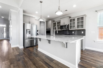 This 5 bedroom, 3 & 1/2 bath home is an absolute showstopper on Cypress Point Par 3 in South Carolina - for sale on GolfHomes.com, golf home, golf lot