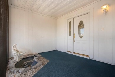 Lakefront Living with Private Pool in a Peaceful 55+ Community on North Lakes Golf Course in Florida - for sale on GolfHomes.com, golf home, golf lot