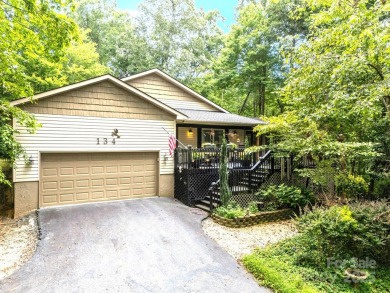 Move-in ready w/many updates, low maintenance yard & seasonal on Rumbling Bald Resort on Lake Lure in North Carolina - for sale on GolfHomes.com, golf home, golf lot
