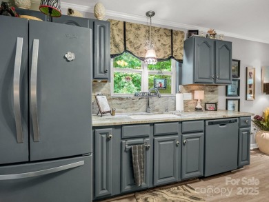Move-in ready w/many updates, low maintenance yard & seasonal on Rumbling Bald Resort on Lake Lure in North Carolina - for sale on GolfHomes.com, golf home, golf lot