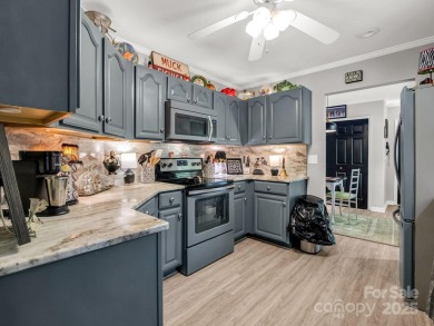 Move-in ready w/many updates, low maintenance yard & seasonal on Rumbling Bald Resort on Lake Lure in North Carolina - for sale on GolfHomes.com, golf home, golf lot