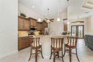 Impressive home with EXPANSIVE VIEWS OF THE GOLF COURSE AND on Saint Andrews South Golf Club in Florida - for sale on GolfHomes.com, golf home, golf lot