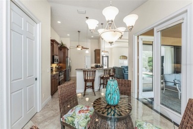 Impressive home with EXPANSIVE VIEWS OF THE GOLF COURSE AND on Saint Andrews South Golf Club in Florida - for sale on GolfHomes.com, golf home, golf lot