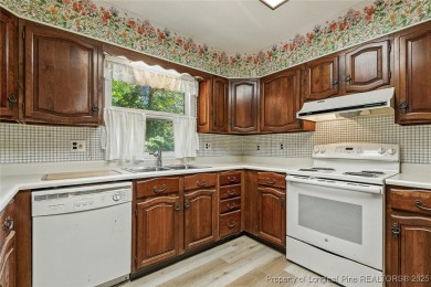 Charming home located in the gated and golf community of on Carolina Trace Country Club in North Carolina - for sale on GolfHomes.com, golf home, golf lot