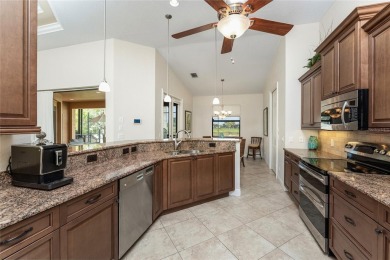 Impressive home with EXPANSIVE VIEWS OF THE GOLF COURSE AND on Saint Andrews South Golf Club in Florida - for sale on GolfHomes.com, golf home, golf lot