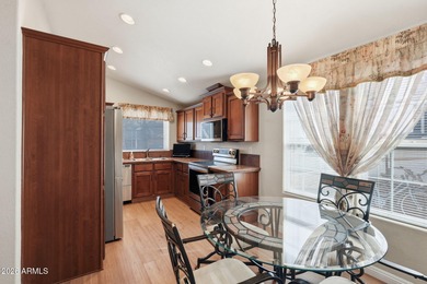 Located behind the guarded entrance of Pueblo El Mirage RV on Pueblo Golf Course in Arizona - for sale on GolfHomes.com, golf home, golf lot