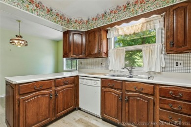 Charming home located in the gated and golf community of on Carolina Trace Country Club in North Carolina - for sale on GolfHomes.com, golf home, golf lot