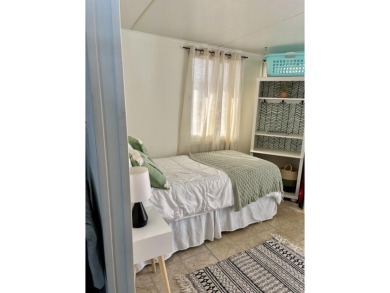 Charming 2BR/1BA beach bungalow on Nettles Island in Jensen on Island Dunes Country Club in Florida - for sale on GolfHomes.com, golf home, golf lot