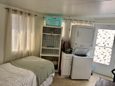 Charming 2BR/1BA beach bungalow on Nettles Island in Jensen on Island Dunes Country Club in Florida - for sale on GolfHomes.com, golf home, golf lot