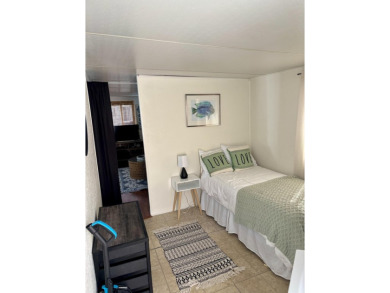 Charming 2BR/1BA beach bungalow on Nettles Island in Jensen on Island Dunes Country Club in Florida - for sale on GolfHomes.com, golf home, golf lot