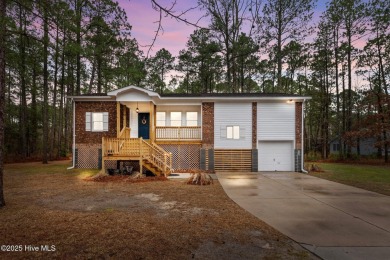 Welcome to 806 Wind Way - a hidden gem nestled in the gated on Harbour Point Golf Club in North Carolina - for sale on GolfHomes.com, golf home, golf lot