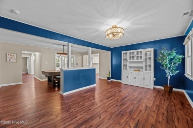 Welcome to 806 Wind Way - a hidden gem nestled in the gated on Harbour Point Golf Club in North Carolina - for sale on GolfHomes.com, golf home, golf lot