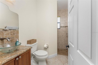 Impressive home with EXPANSIVE VIEWS OF THE GOLF COURSE AND on Saint Andrews South Golf Club in Florida - for sale on GolfHomes.com, golf home, golf lot
