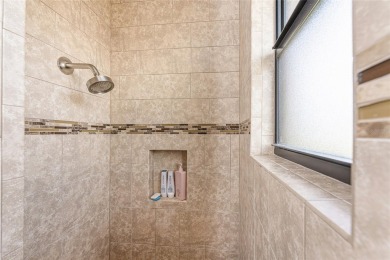 Impressive home with EXPANSIVE VIEWS OF THE GOLF COURSE AND on Saint Andrews South Golf Club in Florida - for sale on GolfHomes.com, golf home, golf lot