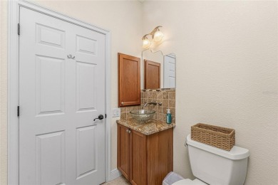 Impressive home with EXPANSIVE VIEWS OF THE GOLF COURSE AND on Saint Andrews South Golf Club in Florida - for sale on GolfHomes.com, golf home, golf lot