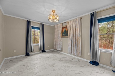 Welcome to 806 Wind Way - a hidden gem nestled in the gated on Harbour Point Golf Club in North Carolina - for sale on GolfHomes.com, golf home, golf lot