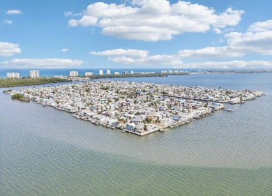 Charming 2BR/1BA beach bungalow on Nettles Island in Jensen on Island Dunes Country Club in Florida - for sale on GolfHomes.com, golf home, golf lot