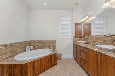 Impressive home with EXPANSIVE VIEWS OF THE GOLF COURSE AND on Saint Andrews South Golf Club in Florida - for sale on GolfHomes.com, golf home, golf lot