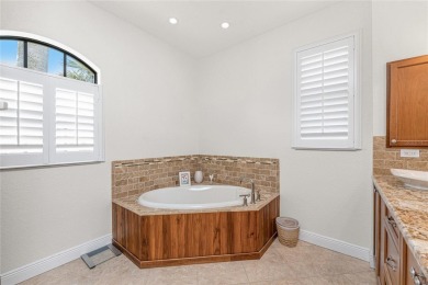 Impressive home with EXPANSIVE VIEWS OF THE GOLF COURSE AND on Saint Andrews South Golf Club in Florida - for sale on GolfHomes.com, golf home, golf lot