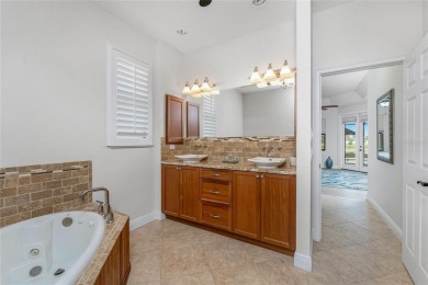 Impressive home with EXPANSIVE VIEWS OF THE GOLF COURSE AND on Saint Andrews South Golf Club in Florida - for sale on GolfHomes.com, golf home, golf lot