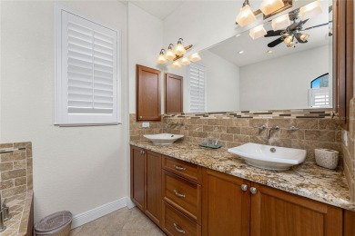 Impressive home with EXPANSIVE VIEWS OF THE GOLF COURSE AND on Saint Andrews South Golf Club in Florida - for sale on GolfHomes.com, golf home, golf lot