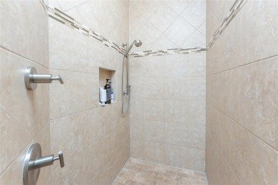 Impressive home with EXPANSIVE VIEWS OF THE GOLF COURSE AND on Saint Andrews South Golf Club in Florida - for sale on GolfHomes.com, golf home, golf lot