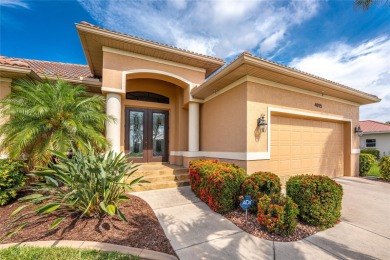 Impressive home with EXPANSIVE VIEWS OF THE GOLF COURSE AND on Saint Andrews South Golf Club in Florida - for sale on GolfHomes.com, golf home, golf lot
