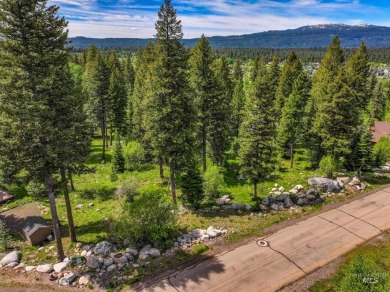 Towering Pines and lovely natural features highlight this choice on McCall Municipal Golf Course in Idaho - for sale on GolfHomes.com, golf home, golf lot