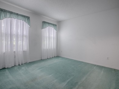 LOCATION! LOCATION! LOCATION! This spacious 3/2 CYPRESS  model on El Diablo Executive Golf Course in Florida - for sale on GolfHomes.com, golf home, golf lot