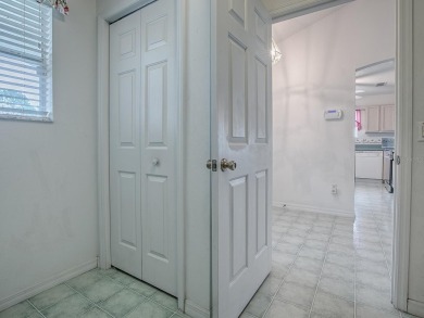 LOCATION! LOCATION! LOCATION! This spacious 3/2 CYPRESS  model on El Diablo Executive Golf Course in Florida - for sale on GolfHomes.com, golf home, golf lot