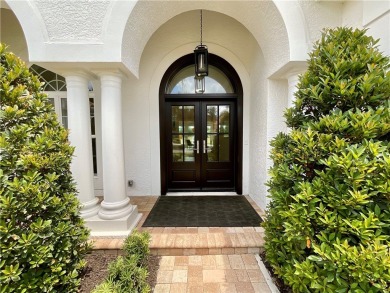 AN EXCEPTIONAL 2023 CUSTOM TRANSFORMATION OF THIS LAKEFRONT HOME on Grand Harbor Golf and Country Club in Florida - for sale on GolfHomes.com, golf home, golf lot