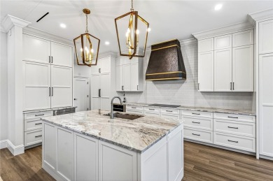 AN EXCEPTIONAL 2023 CUSTOM TRANSFORMATION OF THIS LAKEFRONT HOME on Grand Harbor Golf and Country Club in Florida - for sale on GolfHomes.com, golf home, golf lot