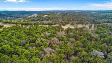 Have you ever vacationed in a luxury resort and wished you could on The Retreat in Texas - for sale on GolfHomes.com, golf home, golf lot