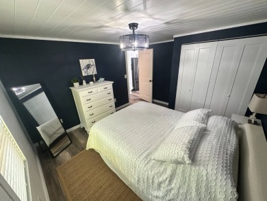 Lot Rent $1037.00 monthly    This beautifully updated home is on Del Tura Golf and Country Club in Florida - for sale on GolfHomes.com, golf home, golf lot