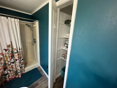 Lot Rent $1037.00 monthly    This beautifully updated home is on Del Tura Golf and Country Club in Florida - for sale on GolfHomes.com, golf home, golf lot