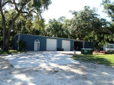 This unique opportunity allows for the purchase of a property on Rainbow Springs Golf and Country Club in Florida - for sale on GolfHomes.com, golf home, golf lot