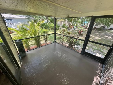 Lot Rent $1037.00 monthly    This beautifully updated home is on Del Tura Golf and Country Club in Florida - for sale on GolfHomes.com, golf home, golf lot