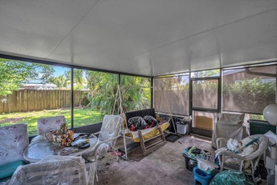 Charming 3-bed, 2-bath home in East Pompano Beach, just minutes on Pompano Beach Golf Course  in Florida - for sale on GolfHomes.com, golf home, golf lot