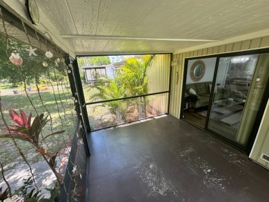 Lot Rent $1037.00 monthly    This beautifully updated home is on Del Tura Golf and Country Club in Florida - for sale on GolfHomes.com, golf home, golf lot