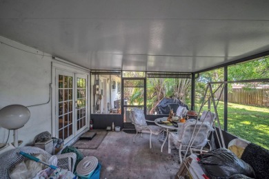 Charming 3-bed, 2-bath home in East Pompano Beach, just minutes on Pompano Beach Golf Course  in Florida - for sale on GolfHomes.com, golf home, golf lot