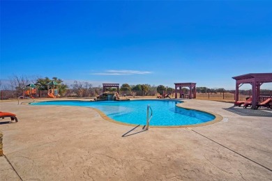 Have you ever vacationed in a luxury resort and wished you could on The Retreat in Texas - for sale on GolfHomes.com, golf home, golf lot
