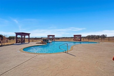 Have you ever vacationed in a luxury resort and wished you could on The Retreat in Texas - for sale on GolfHomes.com, golf home, golf lot