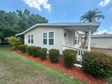 Lot Rent $1037.00 monthly    This beautifully updated home is on Del Tura Golf and Country Club in Florida - for sale on GolfHomes.com, golf home, golf lot