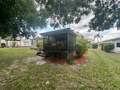 Lot Rent $1037.00 monthly    This beautifully updated home is on Del Tura Golf and Country Club in Florida - for sale on GolfHomes.com, golf home, golf lot