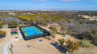 Have you ever vacationed in a luxury resort and wished you could on The Retreat in Texas - for sale on GolfHomes.com, golf home, golf lot