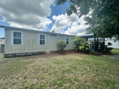 Lot Rent $1037.00 monthly    This beautifully updated home is on Del Tura Golf and Country Club in Florida - for sale on GolfHomes.com, golf home, golf lot